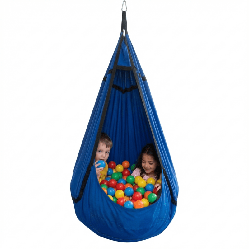 Sensory hammock swing pod for autism and ADHD, child sitting inside with play balls